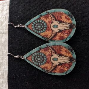 Painted wooden teardrop earrings turquoise and cow skull Western motif.
